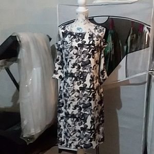 Black and white 3/4 sleeve cut shoulder dress